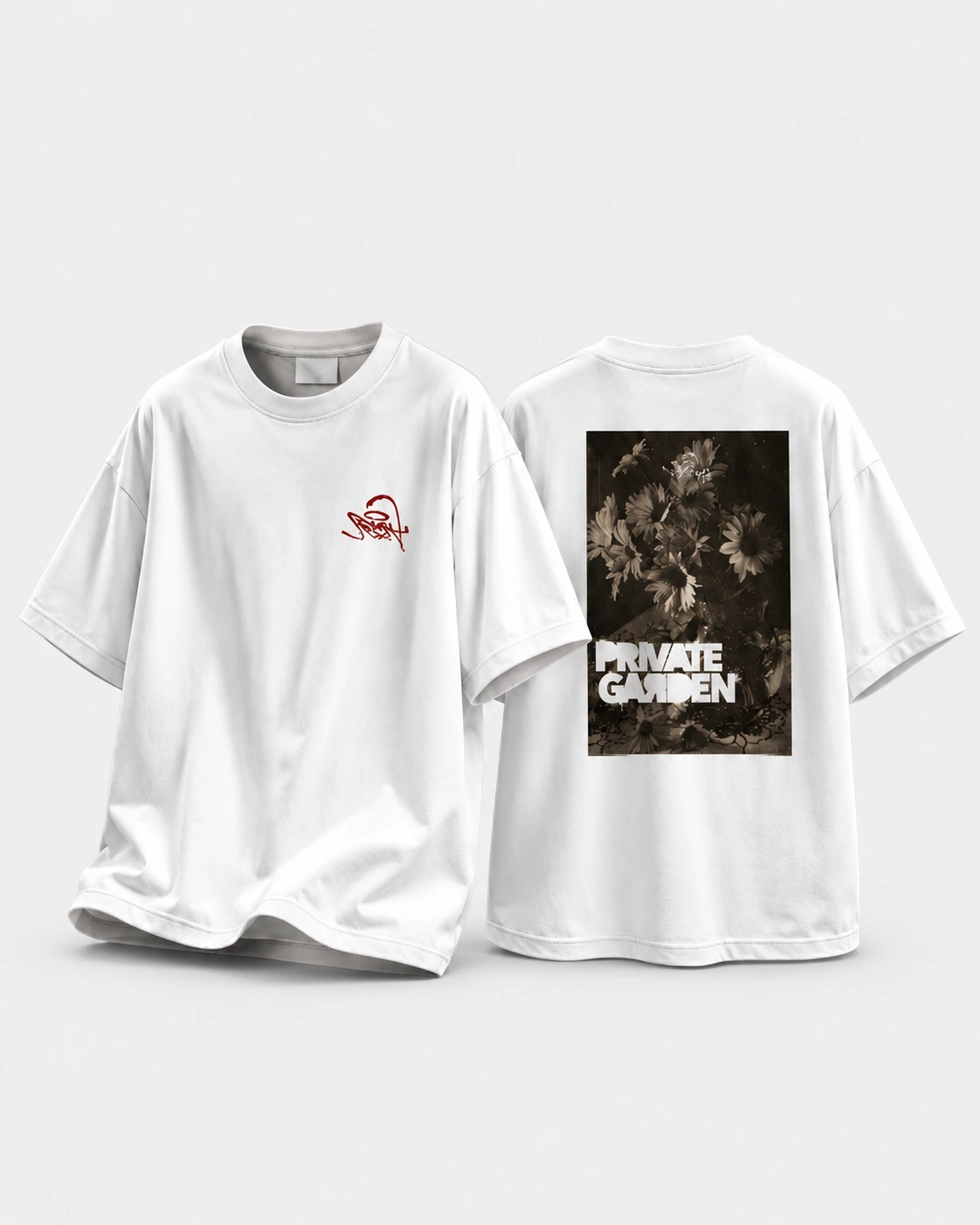 PRIVATE GARDEN — Camiseta branca · arte floral nas costas sobre fundo cinza claro